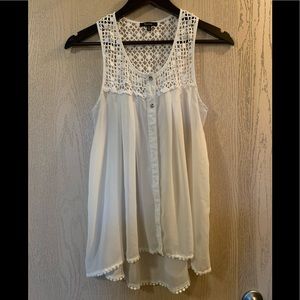 White sleeveless blouse